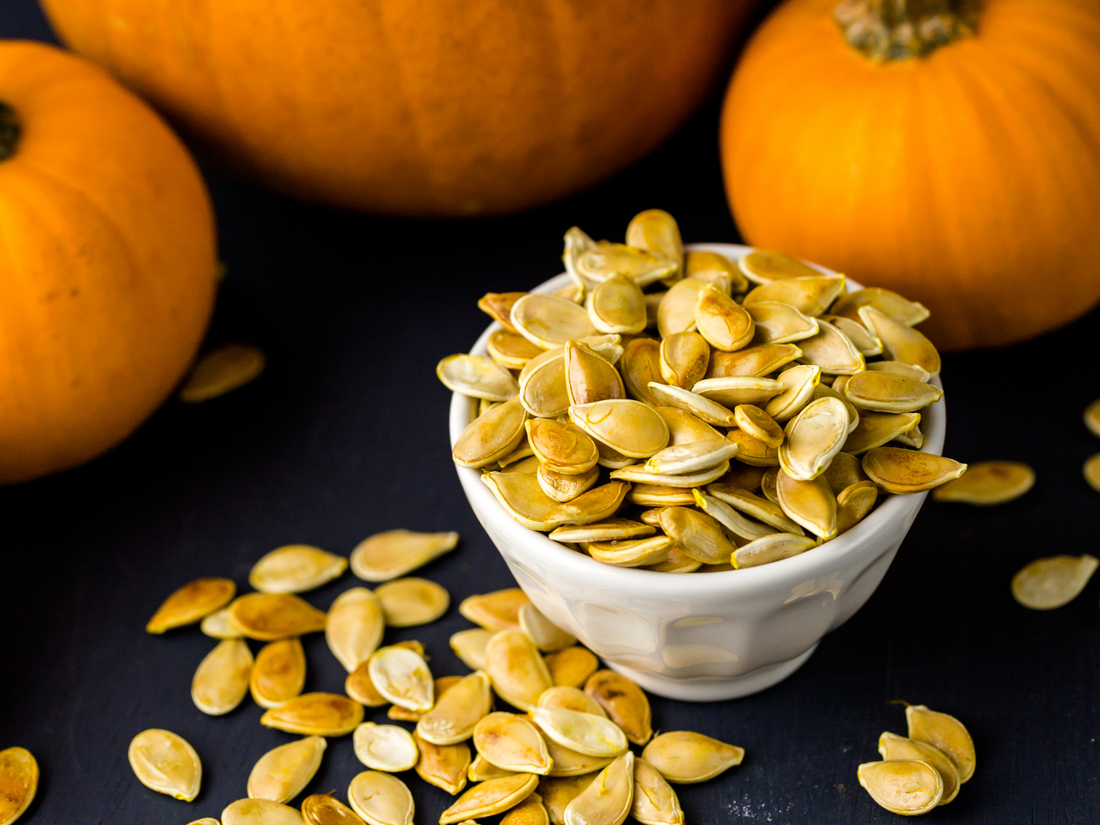 Fresh Orange Pumpkins And Healthy Organic Pumpkin Seeds