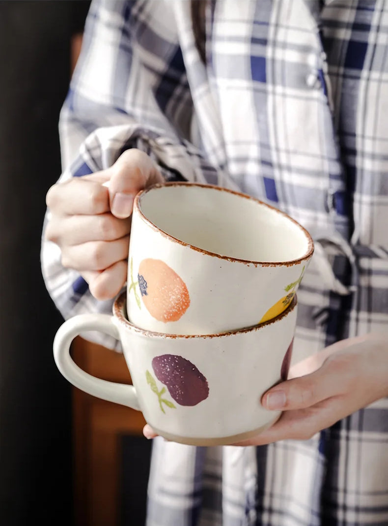Holding Orchard Fruit Ceramic Mugs With Exposed Base Pottery