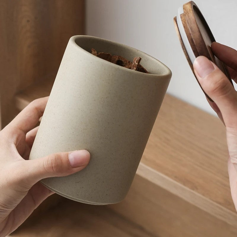 Opening Press On Sealable Lid Of Ceramic Food Storage Jar In Organic Modern Style Pottery