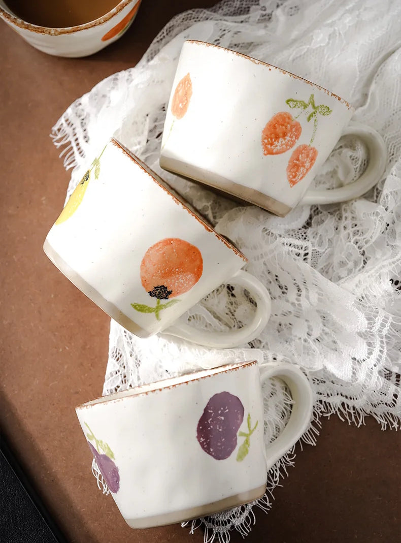Orchard Fruit Matching Ceramic Mugs On Table Craft Style Pottery With Exposed Base