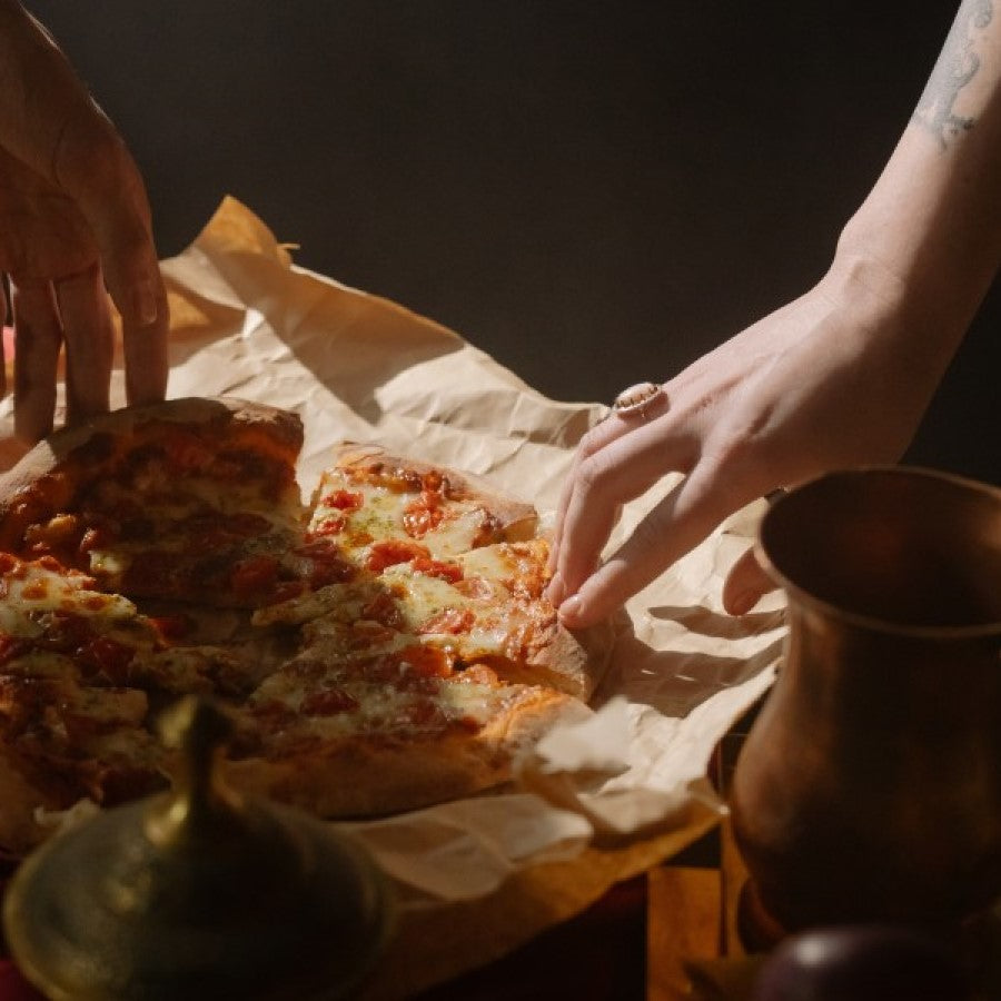 Homemade Pizza Being Served And Enjoyed On Unbleached Wax Paper From Terra Powders