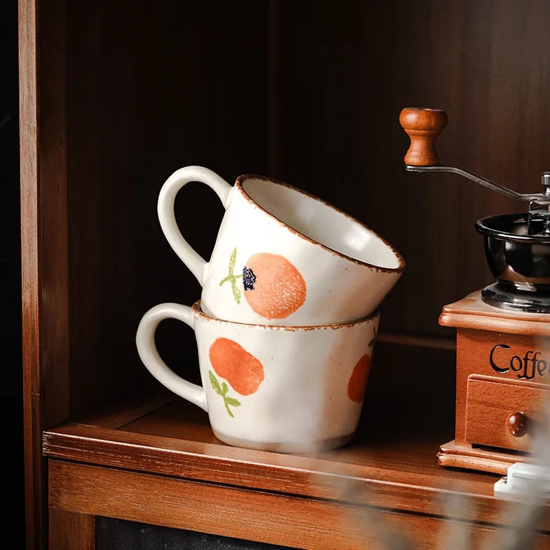 Stacked Mugs With Exposed Base Pottery Orange Color Orchard Fruit Patterns