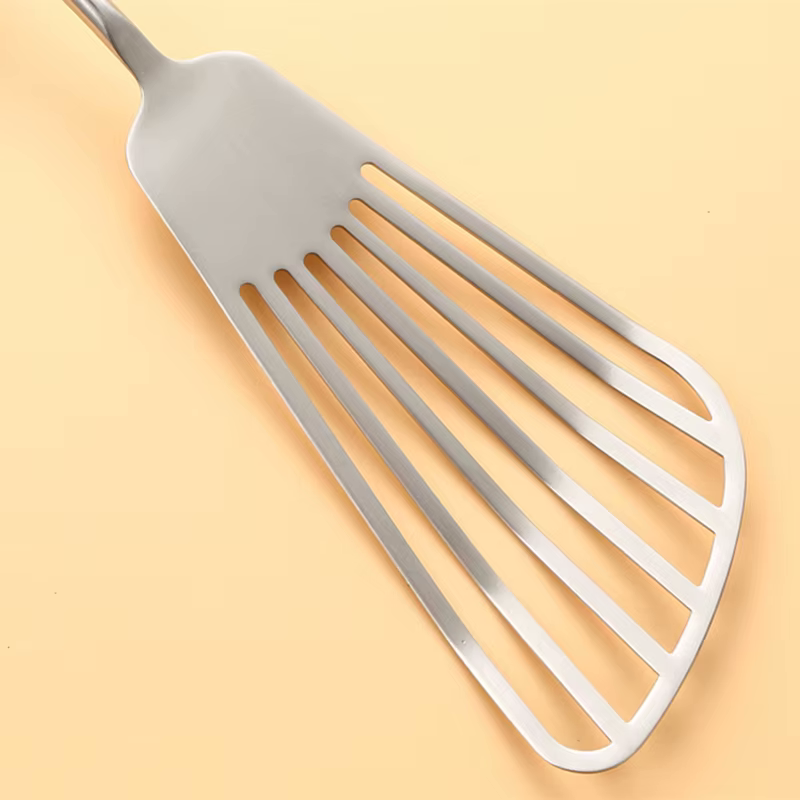 Stainless Steel Slotted Turner Spatula Closeup Sleek Design Kitchen Utensil