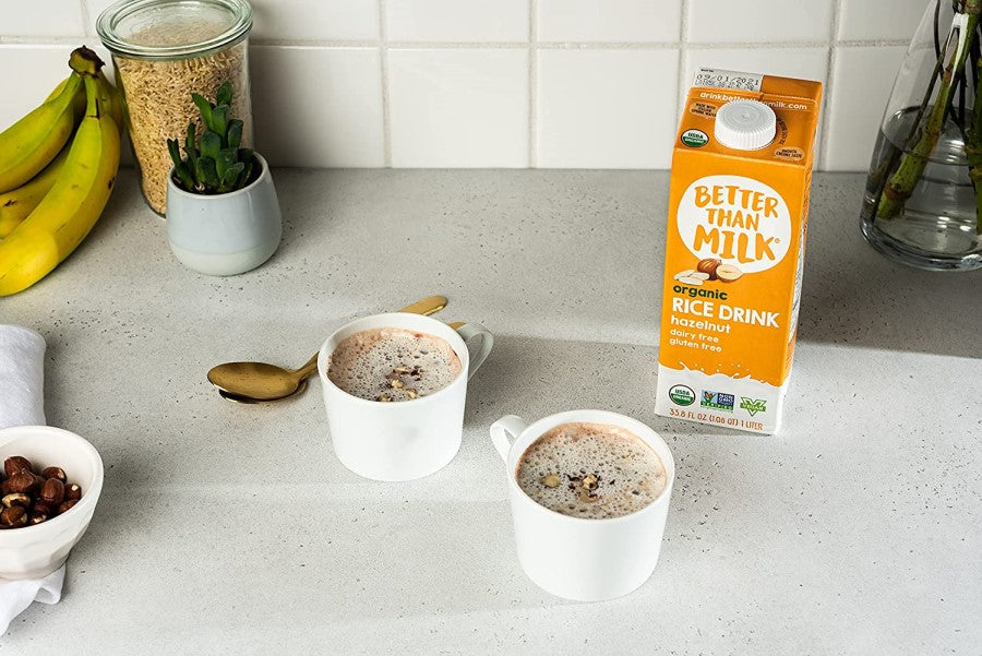 Two Homemade Coffee Lattes On Kitchen Counter With Better Than Milk Dairy Free Creamer Alternative Organic Rice Drink With Hazelnuts