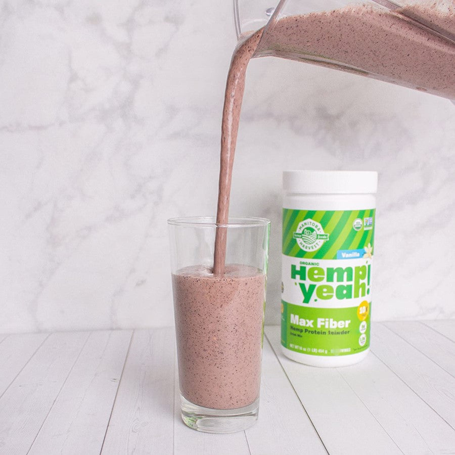 Manitoba Harvest Organic Hemp Yeah Max Fiber Vanilla Protein Powder Hemp Smoothie Pouring Into Glass