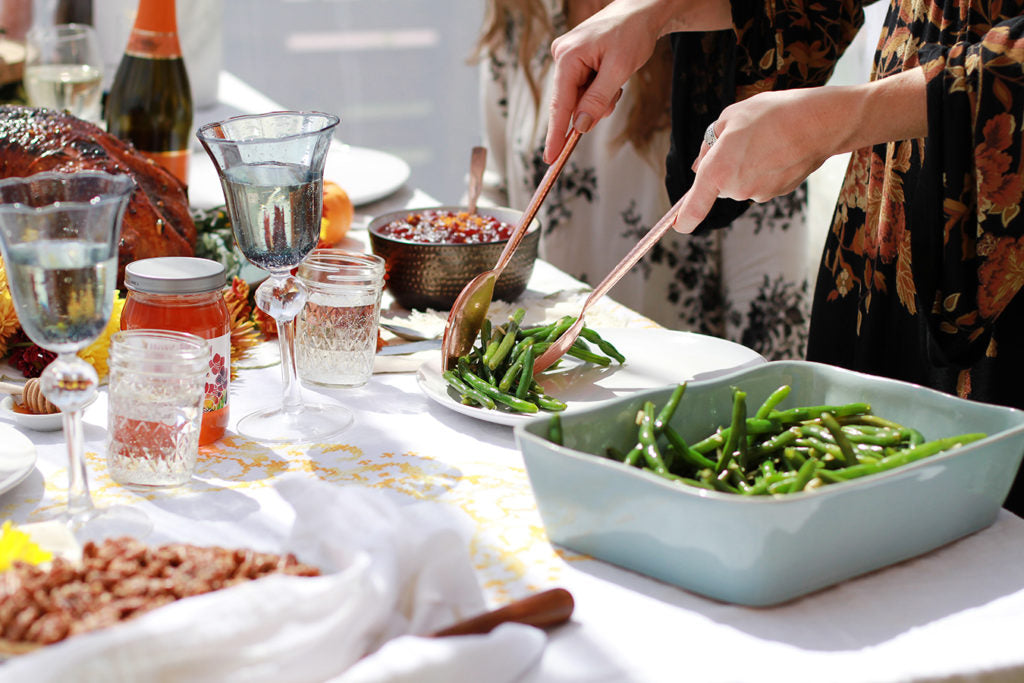 Serving Honey Almond Green Bean Casserole At Outdoor Picnic Gathering Recipe Uses Madhava Organic Honey