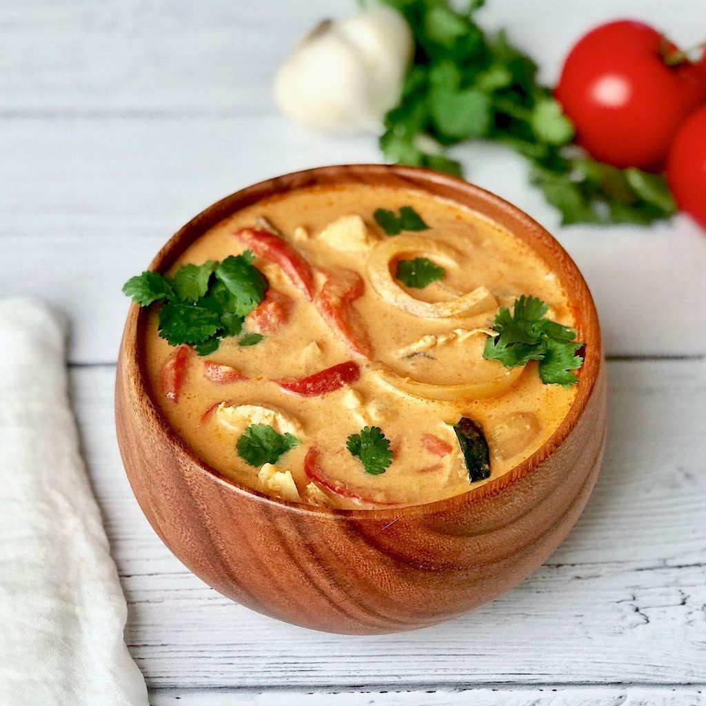 Healthy Red Coconut Curry Meal In Wooden Bowl Yais Thai